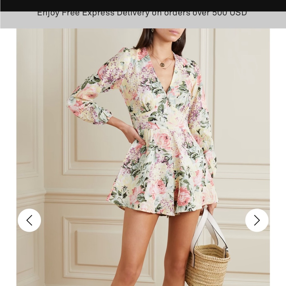 Faithfull the Brand Floral Jumpsuit in Pink and Green.
